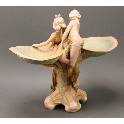 264 - A Royal Dux Art Nouveau figural centrepiece, modelled as nymphs flanked by waterlilies, 35cm high, m... 