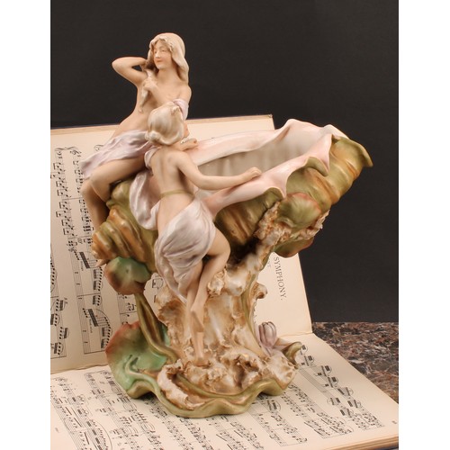 263 - A Royal Dux Art Nouveau figural centrepiece, modelled as nymphs aboard a conch shell, 35cm high, imp... 