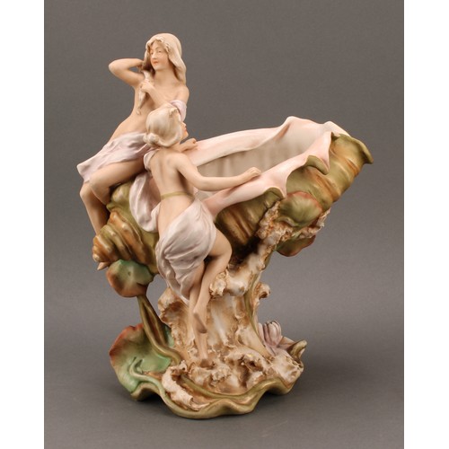 263 - A Royal Dux Art Nouveau figural centrepiece, modelled as nymphs aboard a conch shell, 35cm high, imp... 