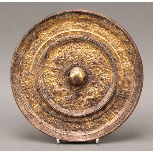 1283 - A Chinese gilt bronze circular mirror, cast with a border of zodiac animals, 21.5cm diameter