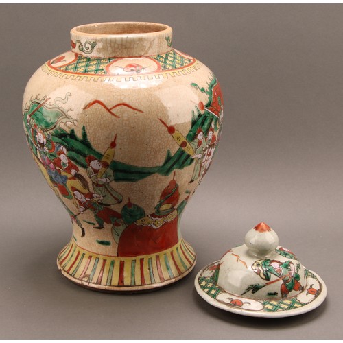 1294 - A Chinese baluster jar and cover, painted in polychrome enamels with warriors, on a crackle glaze gr... 