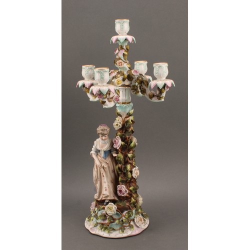 258 - A pair of Sitzendorf porcelain figural five-light candelabra, modelled as a courting couple, each pa... 