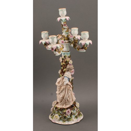 258 - A pair of Sitzendorf porcelain figural five-light candelabra, modelled as a courting couple, each pa... 