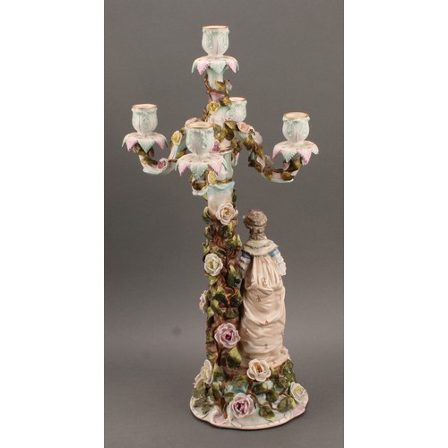 258 - A pair of Sitzendorf porcelain figural five-light candelabra, modelled as a courting couple, each pa... 