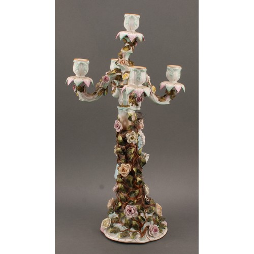 258 - A pair of Sitzendorf porcelain figural five-light candelabra, modelled as a courting couple, each pa... 