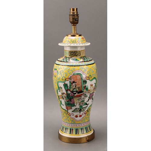 1295 - A Chinese baluster vase, painted in polychrome enamels with warriors on a yellow ground, mounted as ... 