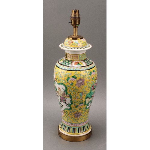 1295 - A Chinese baluster vase, painted in polychrome enamels with warriors on a yellow ground, mounted as ... 