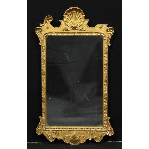 2568 - A George I Revival giltwood and gesso pier glass, in the manner of John Belchier, plain mirror plate... 