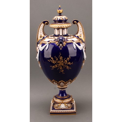 126 - A large Royal Worcester vase and cover, painted by Harry Davies (1885-1970), signed, modelled in the... 