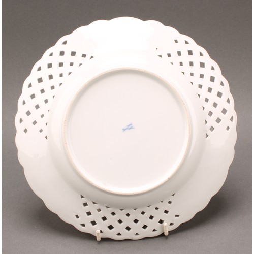 230 - A German reticulated porcelain fourteen-piece dessert service, comprising a pair of comports and twe... 