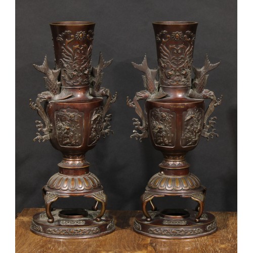 1377 - A pair of large Japanese brown patinated bronze vases, cast in the Archaic taste with birds, prunus,... 