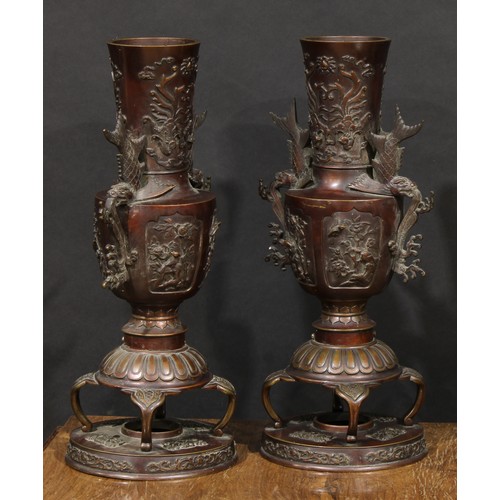 1377 - A pair of large Japanese brown patinated bronze vases, cast in the Archaic taste with birds, prunus,... 