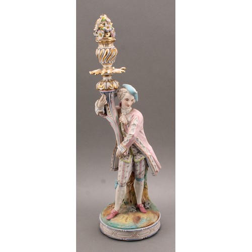 246 - A pair of Continental bisque porcelain figural candlesticks, as a courting couple in 18th century dr... 