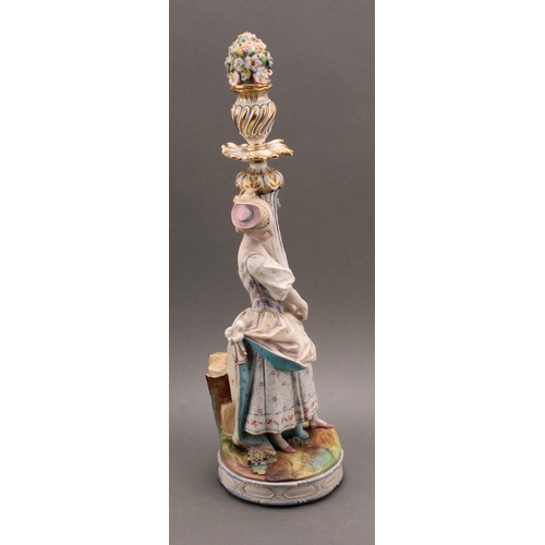 246 - A pair of Continental bisque porcelain figural candlesticks, as a courting couple in 18th century dr... 