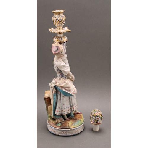 246 - A pair of Continental bisque porcelain figural candlesticks, as a courting couple in 18th century dr... 