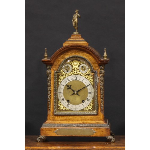 2454 - A Victorian gilt metal mounted oak bracket clock, 16cm arched brass dial with silvered chapter ring ... 