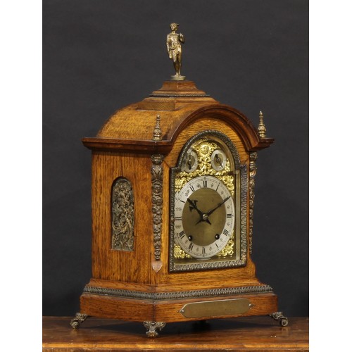 2454 - A Victorian gilt metal mounted oak bracket clock, 16cm arched brass dial with silvered chapter ring ... 