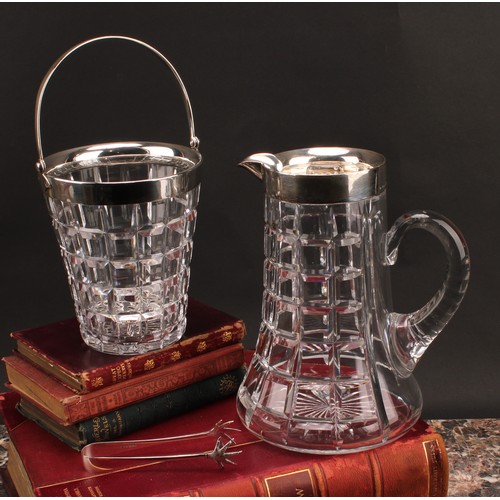 994 - An Art Deco period silver mounted refreshment suite, comprising lemonade jug and ice bucket, star-cu... 