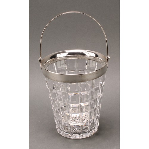 994 - An Art Deco period silver mounted refreshment suite, comprising lemonade jug and ice bucket, star-cu... 