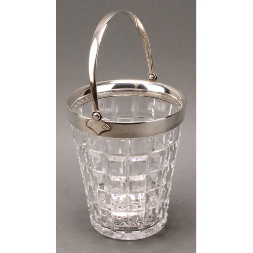 994 - An Art Deco period silver mounted refreshment suite, comprising lemonade jug and ice bucket, star-cu... 