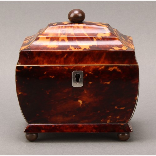 2200 - A George IV tortoiseshell sarcophagus tea caddy, of small proportions, hinged cover enclosing a lidd... 