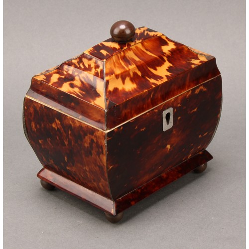 2200 - A George IV tortoiseshell sarcophagus tea caddy, of small proportions, hinged cover enclosing a lidd... 