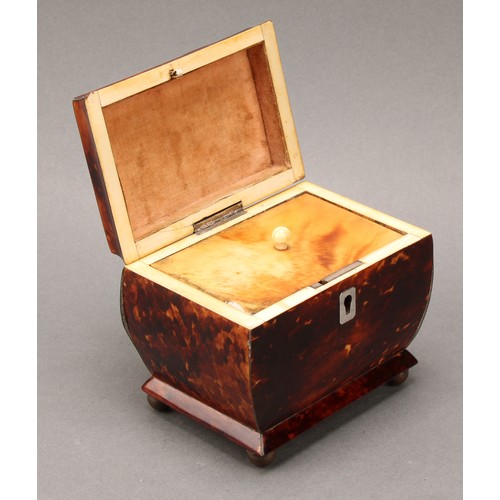 2200 - A George IV tortoiseshell sarcophagus tea caddy, of small proportions, hinged cover enclosing a lidd... 