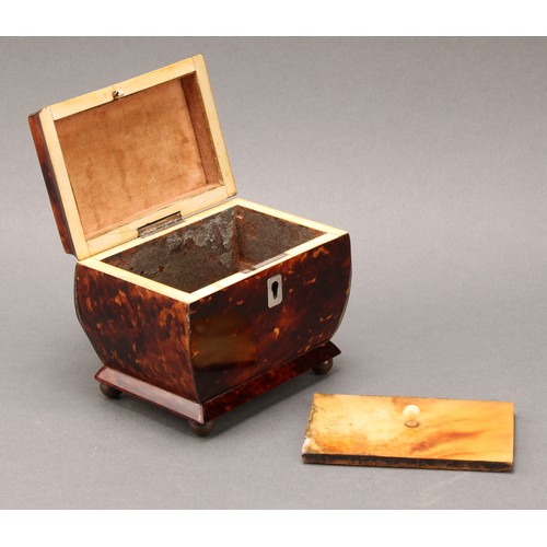 2200 - A George IV tortoiseshell sarcophagus tea caddy, of small proportions, hinged cover enclosing a lidd... 