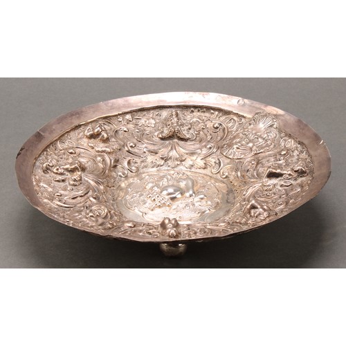 731 - A Continental silver circular dish, probably German, chased in the Renaissance taste with a border o... 