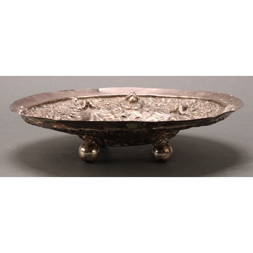 731 - A Continental silver circular dish, probably German, chased in the Renaissance taste with a border o... 