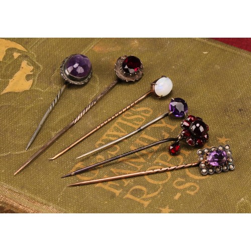 1401 - Stick Pins - a late 19th century 9ct rose gold pin, set with a single polished opal cabochon, 5.5cm,... 