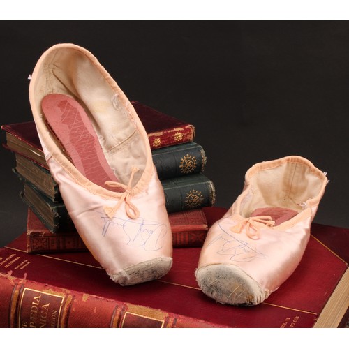 2473 - Autographs - a pair of Innovation Dance Workshop silk ballet shoes, signed by Darcy Bussell (b. 1969... 