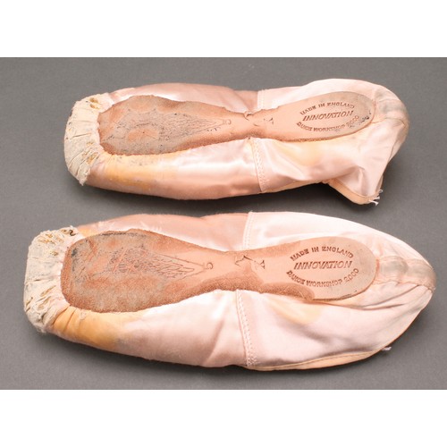 2473 - Autographs - a pair of Innovation Dance Workshop silk ballet shoes, signed by Darcy Bussell (b. 1969... 