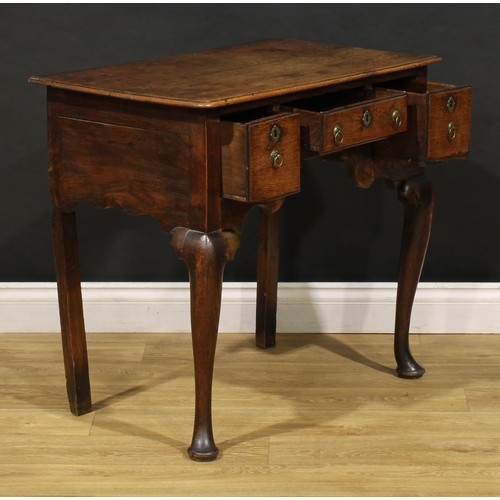 2360 - A George II oak lowboy, rounded rectangular moulded oversailing top above three frieze drawers, shap... 