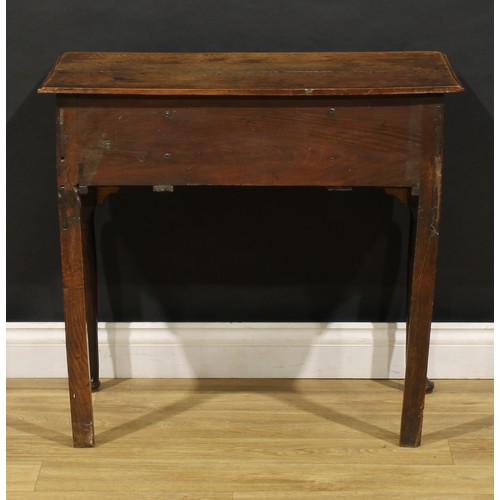 2360 - A George II oak lowboy, rounded rectangular moulded oversailing top above three frieze drawers, shap... 