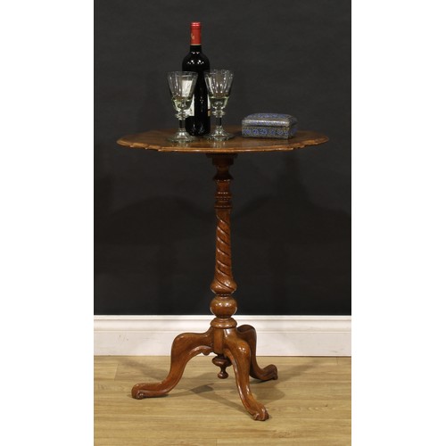 1952 - A Victorian mahogany shaped oval pedestal wine table, spirally turned pillar, cabriole legs, 72cm hi... 