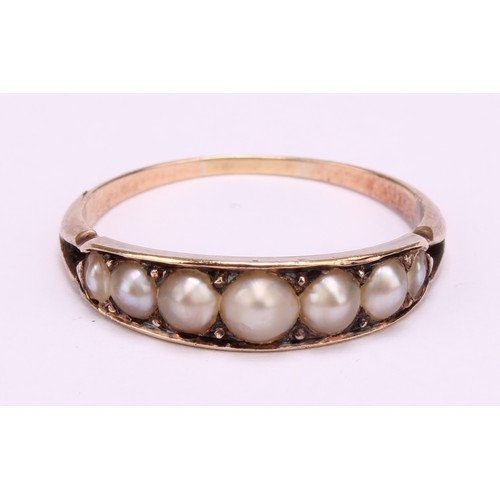 1239 - A Victorian tested 9ct gold seed pearl mourning ring, consists of seven graduated half seed pearls, ... 