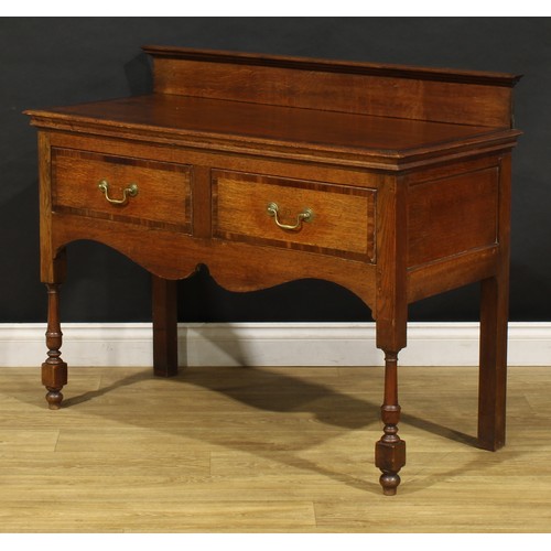 2221 - A 19th century mahogany crossbanded oak side or serving table, rectangular top with moulded edge and... 