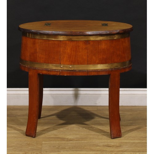 2471 - An early 20th century coopered hardwood drinks chest, hinged top folding flat as a bar, outswept leg... 