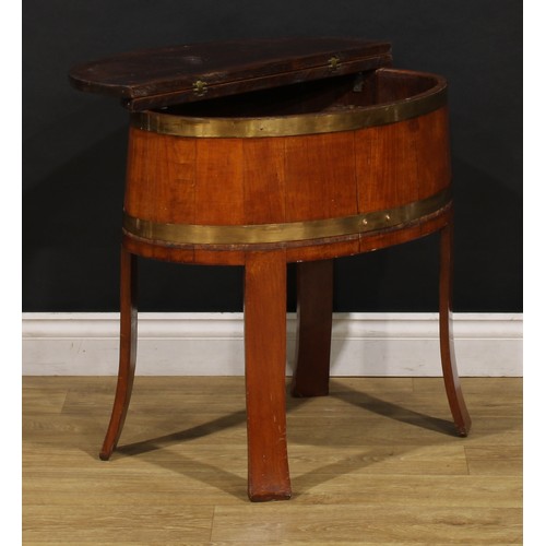 2471 - An early 20th century coopered hardwood drinks chest, hinged top folding flat as a bar, outswept leg... 