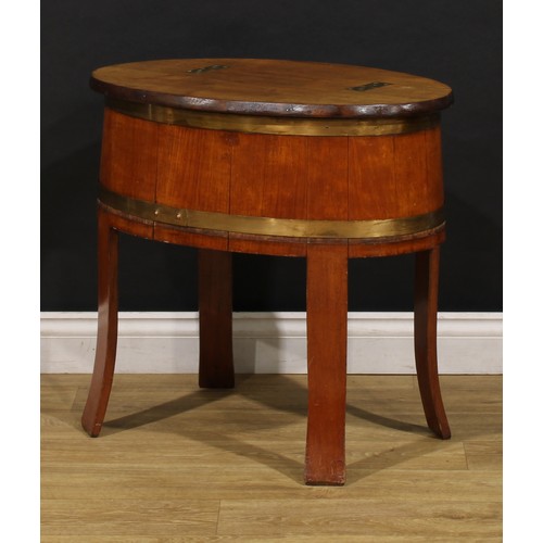 2471 - An early 20th century coopered hardwood drinks chest, hinged top folding flat as a bar, outswept leg... 