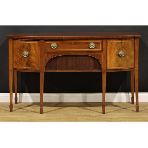 2093 - A 19th century mahogany sideboard or serving table, slightly oversailing top above a frieze drawer a... 