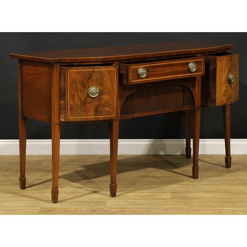 2093 - A 19th century mahogany sideboard or serving table, slightly oversailing top above a frieze drawer a... 