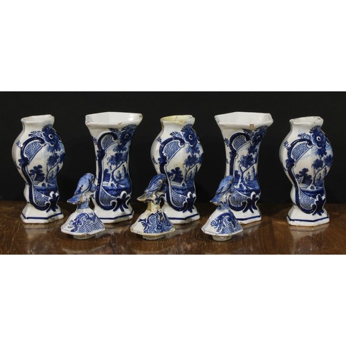 15 - An 18th century Delft five-piece garniture, decorated in underglaze blue with figures beneath a tree... 