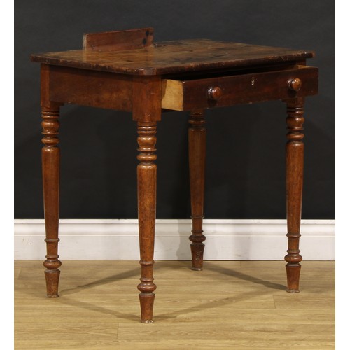 1951 - A Victorian mahogany rounded rectangular chamber writing table, the top with scribe compartment, dra... 