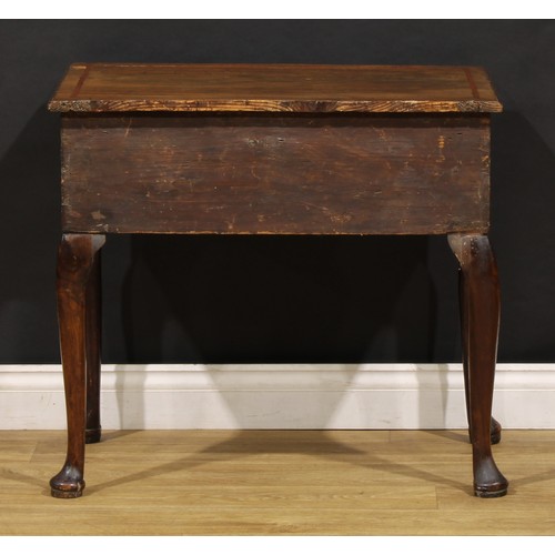 1497 - A George II walnut lowboy, moulded top above three frieze drawers, shaped apron, cabriole legs, pad ... 