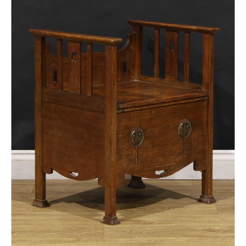 1510 - An Arts & Crafts copper mounted oak bedroom night seat, hinged top, pierced and applied with Art Nou... 