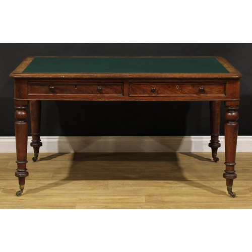 1949 - A Victorian mahogany library table, rounded rectangular top with inset writing surface above a pair ... 