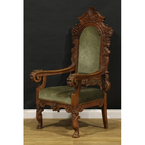 2354 - A Continental Baroque Revival armchair, stuffed-over upholstery, carved with Green Man masks, female... 