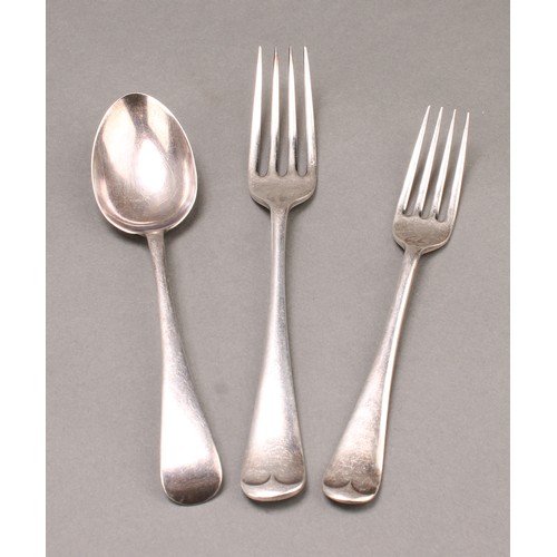 816 - A George V silver part table service, comprising twelve dinner forks, twelve dessert forks and eleve... 